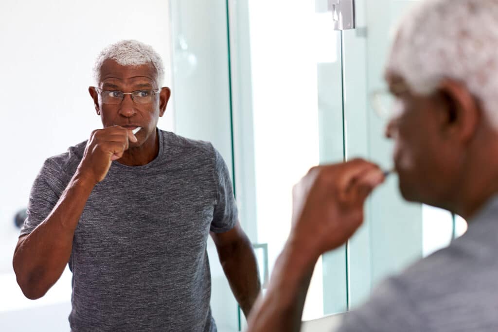 Personal care services help seniors maintain healthy smiles and prevent oral infections at home